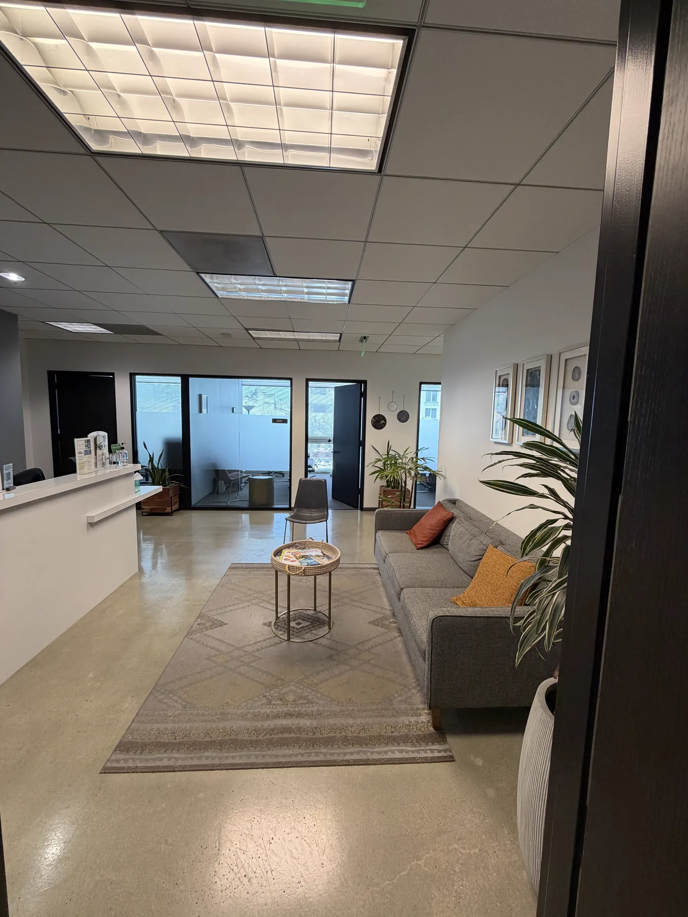 LA Chiro Care front desk and waiting area seating